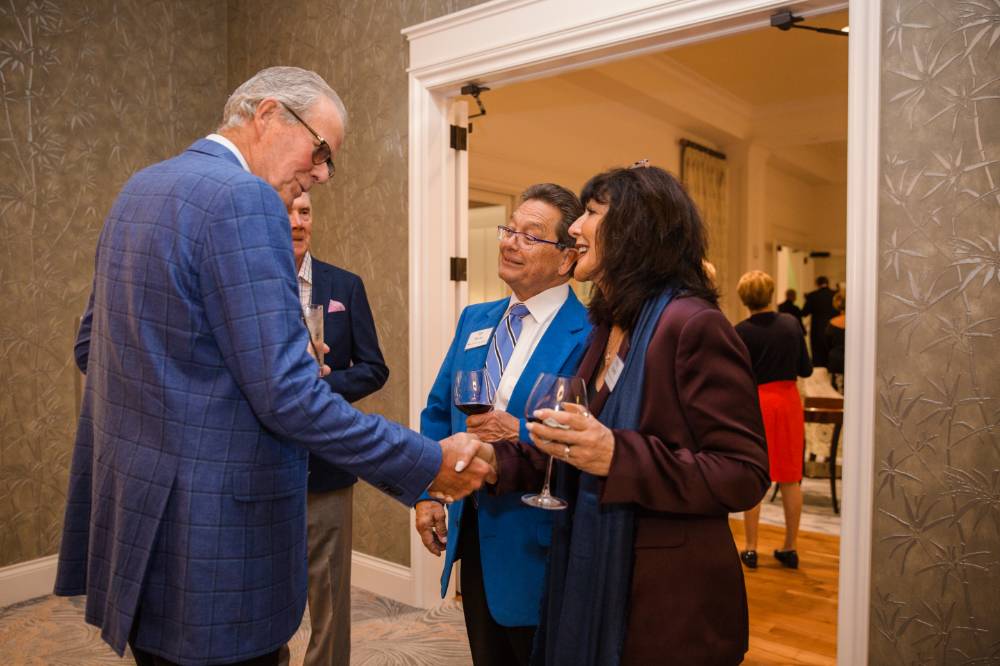President-elect Philomena Mantella shaking hands with guests at Naples 2019